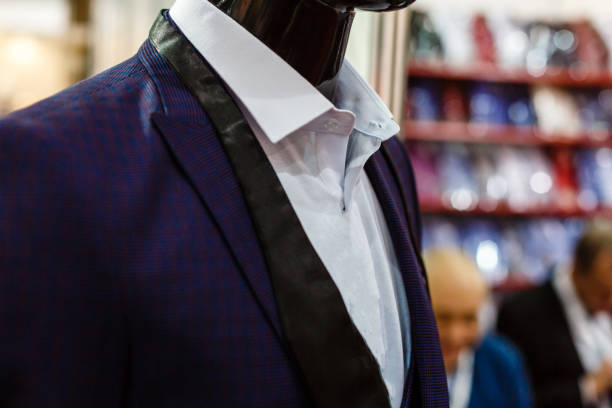istock Suit in a showcase of a luxury store 937520088