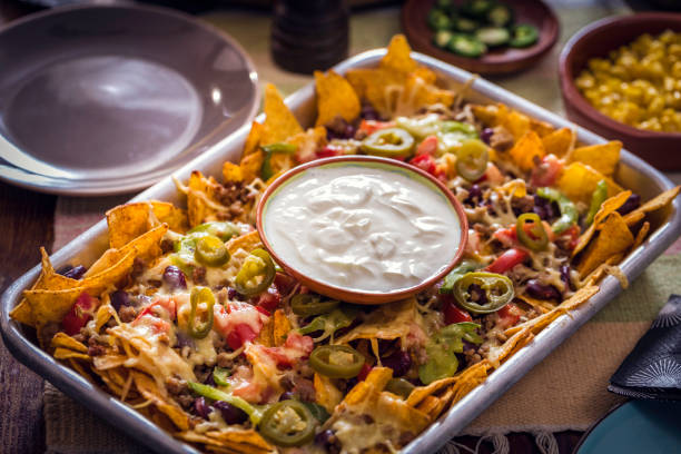 istock Nachos Tortilla Chips with Salsa, Minced Meat and Jalapenos 937522474