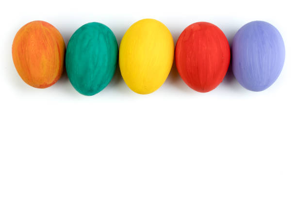 istock Happy Easter card. Colorful shiny easter eggs on isolated white background. Copy space for text 937533986