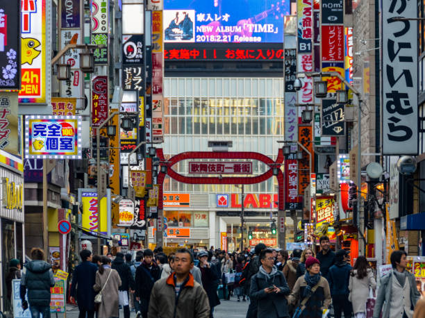 istock Crowded daytime street scene in Tokyo, Japan 937536206