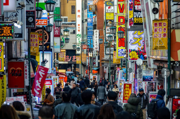 istock Crowded daytime street scene in Tokyo, Japan 937536304