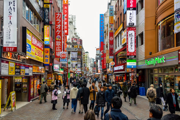 istock Crowded daytime street scene in Tokyo, Japan 937536564