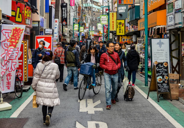 istock Crowded daytime street scene in Tokyo, Japan 937536804
