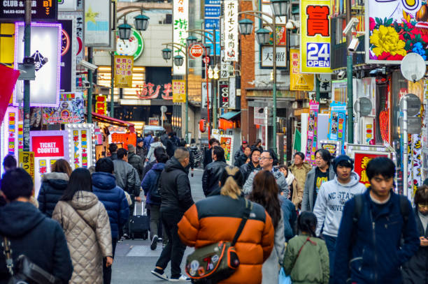 istock Crowded daytime street scene in Tokyo, Japan 937536968