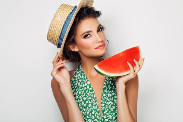 istock Woman with water melon 937539356