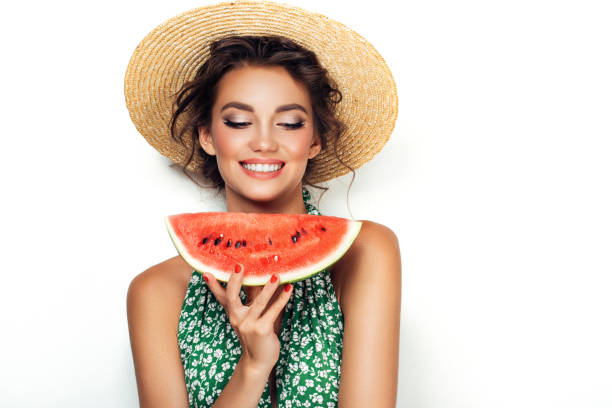 istock Woman with water melon 937539378
