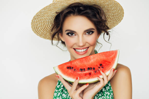 istock Woman with water melon 937539414