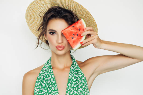 istock Woman with water melon 937539546