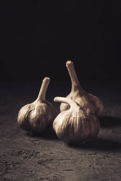 istock Garlic fresh Food Still Life toned low key 937539976