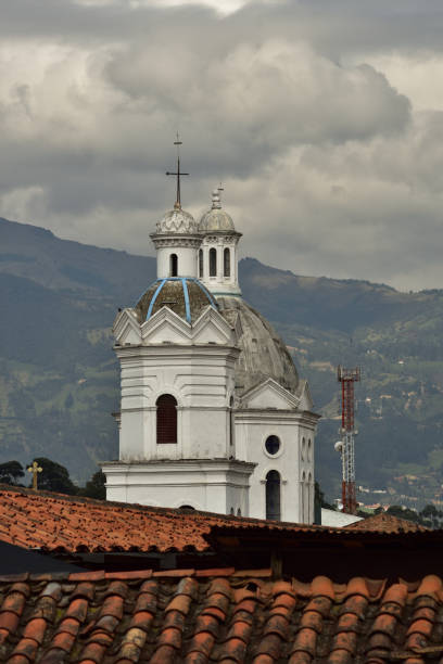 istock Church spires at Plaza San Sebastian Cuenca Ecuador 937543930