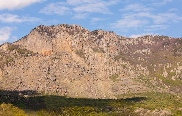 istock rocky ridge with crumbled slope inaccessible high mountain walk 937544380
