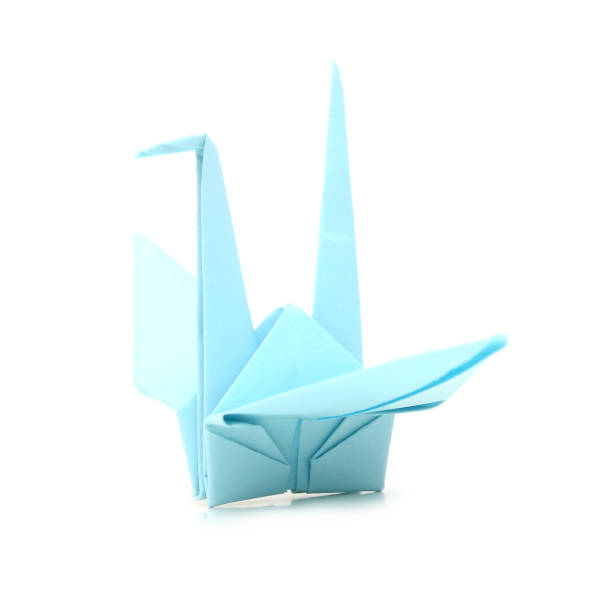 istock Blue origami paper crane 937547624