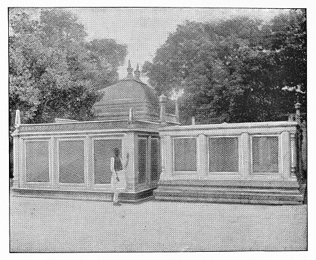 Man beside a tomb in Agra, India during the british era. Vintage halftone circa late 19th century.