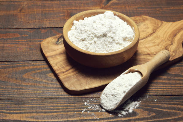 istock Wheat flour in a wooden bowl 937558874