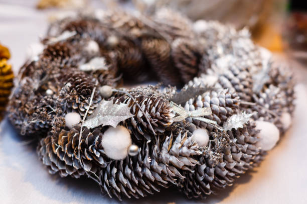 istock decorative Christmas wreath of cones 937565154