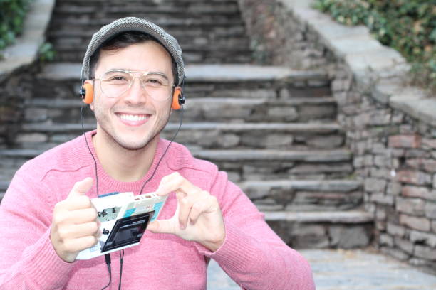 istock Guy listening to Stereo cassette Walkman 937568498