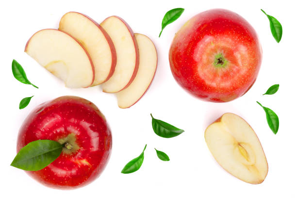 istock red apples with slices and leaves isolated on white background top view. Set or collection. Flat lay pattern 937568534