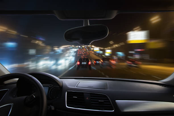 car moving on highway at night - car dashboard night driving imagens e fotografias de stock