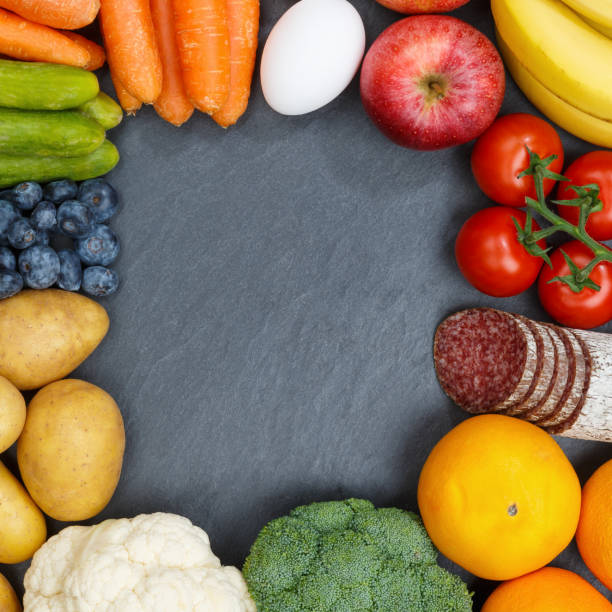 istock Fruits and vegetables food collection frame square slate copyspace 937574446