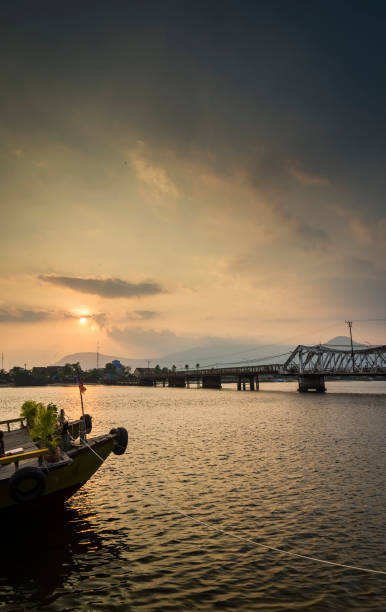 istock landmark old bridge and river at sunset in kampot cambodia 937574452