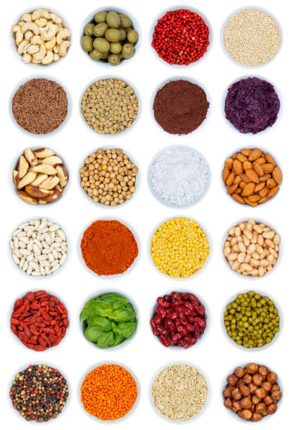 istock Collection of spices and herbs vegetables nuts portrait format 937574466