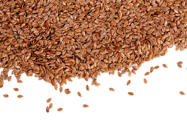 istock flax seeds isolated on white background with copy space for your text. Top view 937579618
