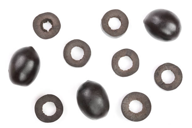 istock whole and sliced black olives isolated on white background. Top view. Flat lay pattern 937586786