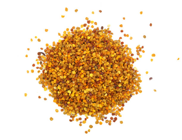 istock fresh bee pollen isolated on white background. Top view. Flat lay 937590002