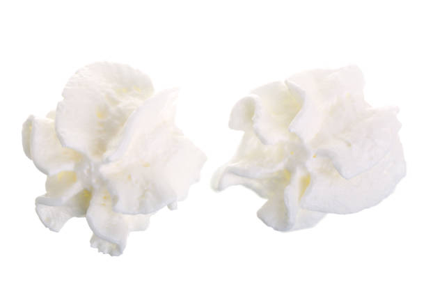 istock whipped cream or meringue isolated on white background. Top view. Flat lay 937592334