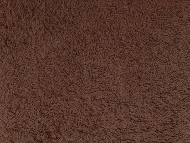 Photo of Brown chenille rug textured