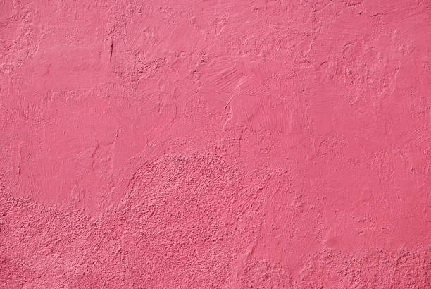 pintado textura de pared rosa - rosa color fotografías e imágenes de stock