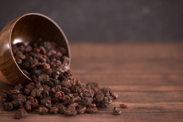 Raisins in a Wooden Bowl