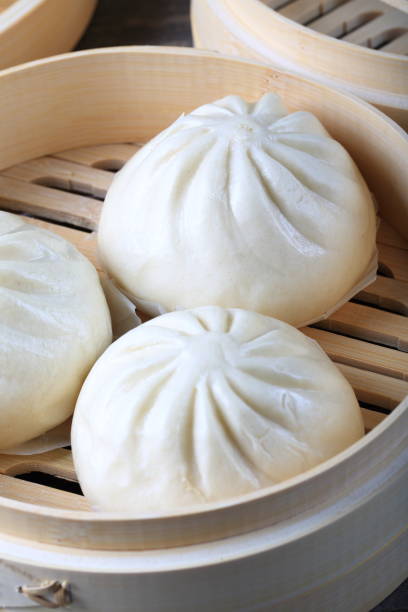 istock Dumplings in a Bamboo Steamer 937648240