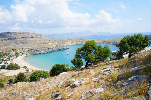 Landscape near Lindos, Rhodos island with bay, mountains and green