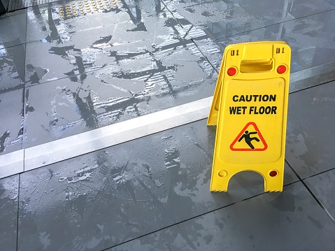 Wet floor sign in airport