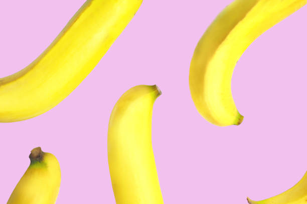 istock Isolated (art,fashion or design) of yellow banana fruit. 937689248