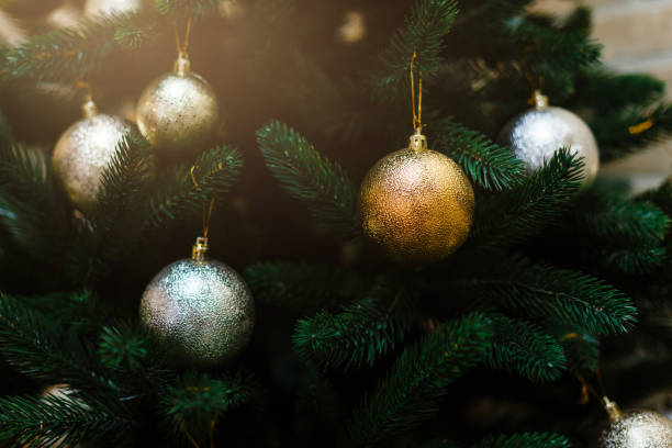 Christmas backround. Fir branch with decorations.