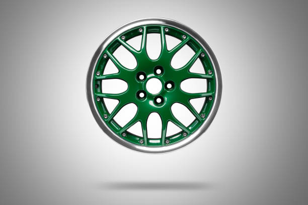 Sport car Green alloys rim at grey background