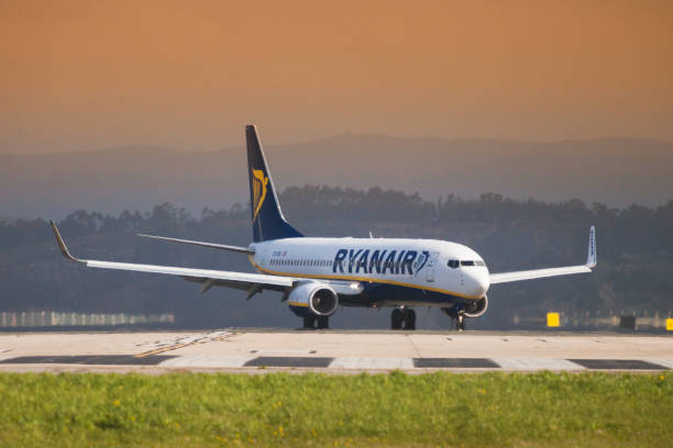 Ryanair Boing 737 on the landing strip. Seve Ballesteros airport, Santander, Spain - 12 March, 2018: Ryanair Boing 737 on the landing strip. The airline Ryanair offers flights from Santander to different European cities such as London, Rome, Dublin, Budapest ... boeing 737 photos stock pictures, royalty-free photos & images