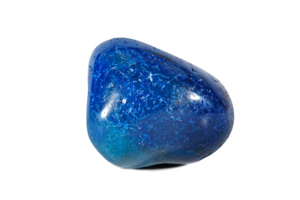 istock Macro shooting of natural gemstone. Mineral blue agate, Brazil. Isolated object on a white background 937704304