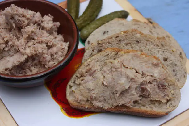 Pork rillettes on bread slices