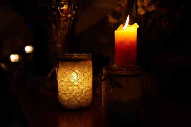 istock Decorative candles burning in dark scene 937711342