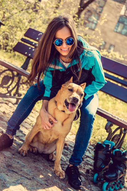 istock Casual brunette female with her brown dog. 937712036