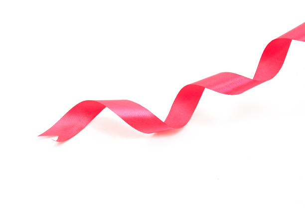 istock Pink curly ribbon isolated on white 937715630