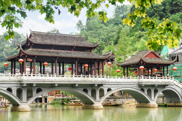 istock View of bridge over the Tuojiang River, Phoenix Ancient Town 937715956