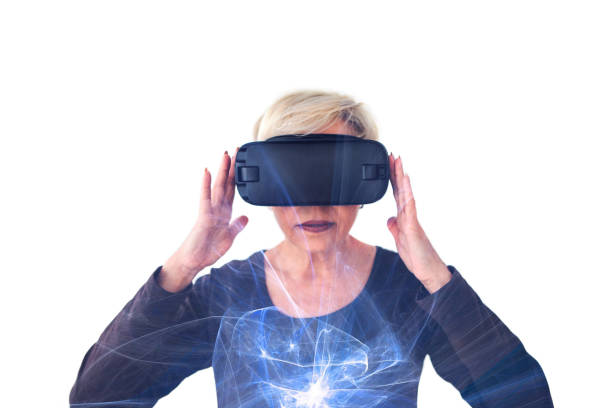 istock An elderly woman in virtual reality glasses. An elderly person using modern technology. 937716380