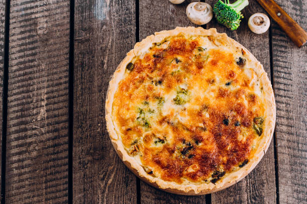 istock Pie with mushrooms, chicken and herbs on the wooden table 937717362