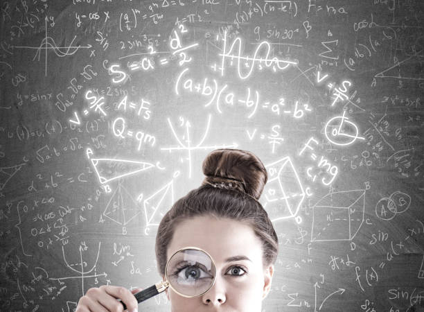 istock Magnifying glass woman, formulas 937720796