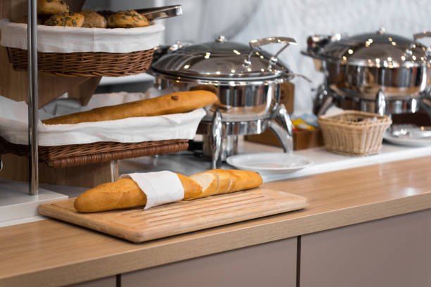 istock Fresh bread at the wooden table 937723860