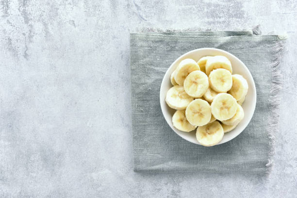 istock Banana slices in bowl 937727232